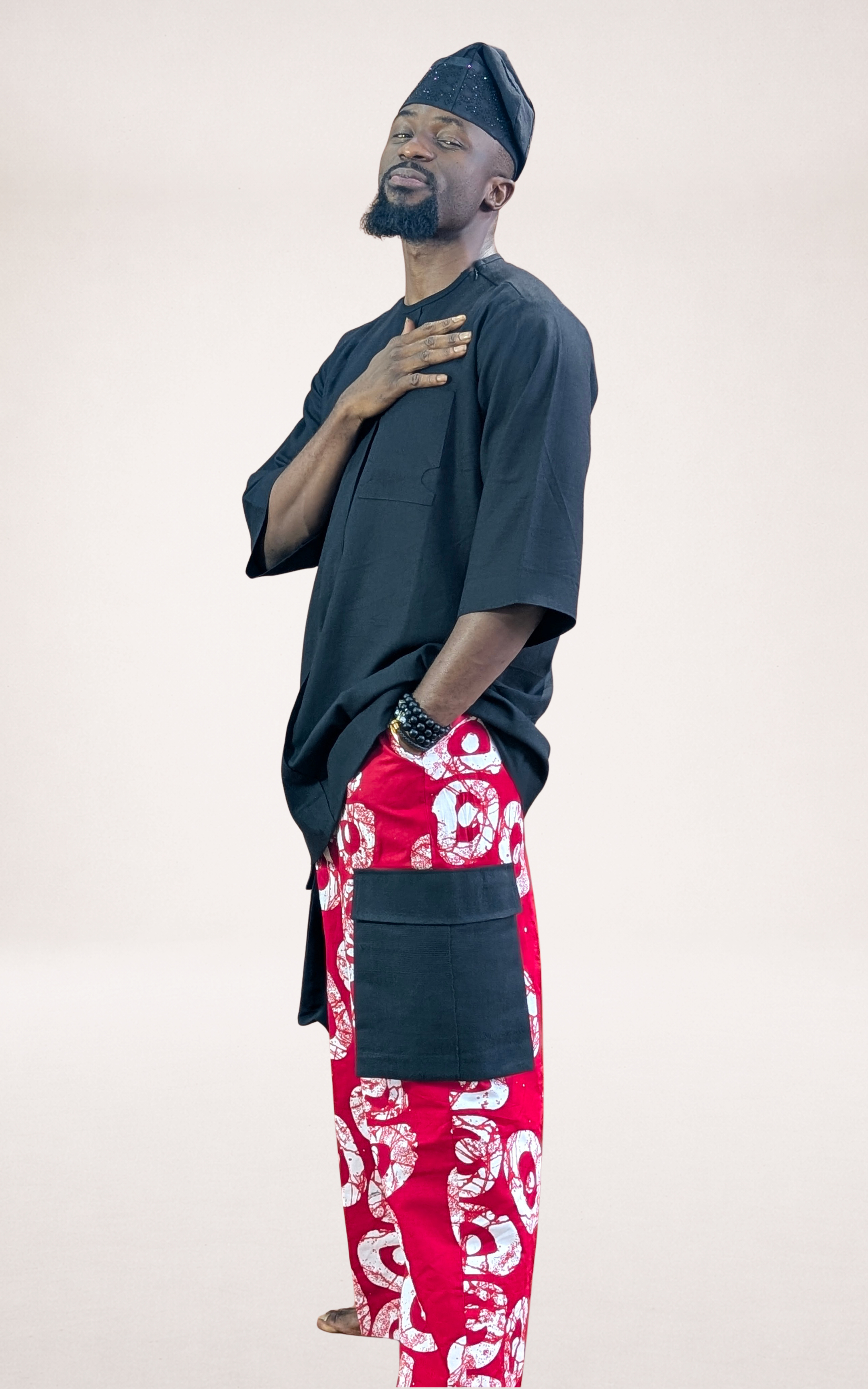 Red Adire Trousers, Black Native Shirt and Black Cap - page 2